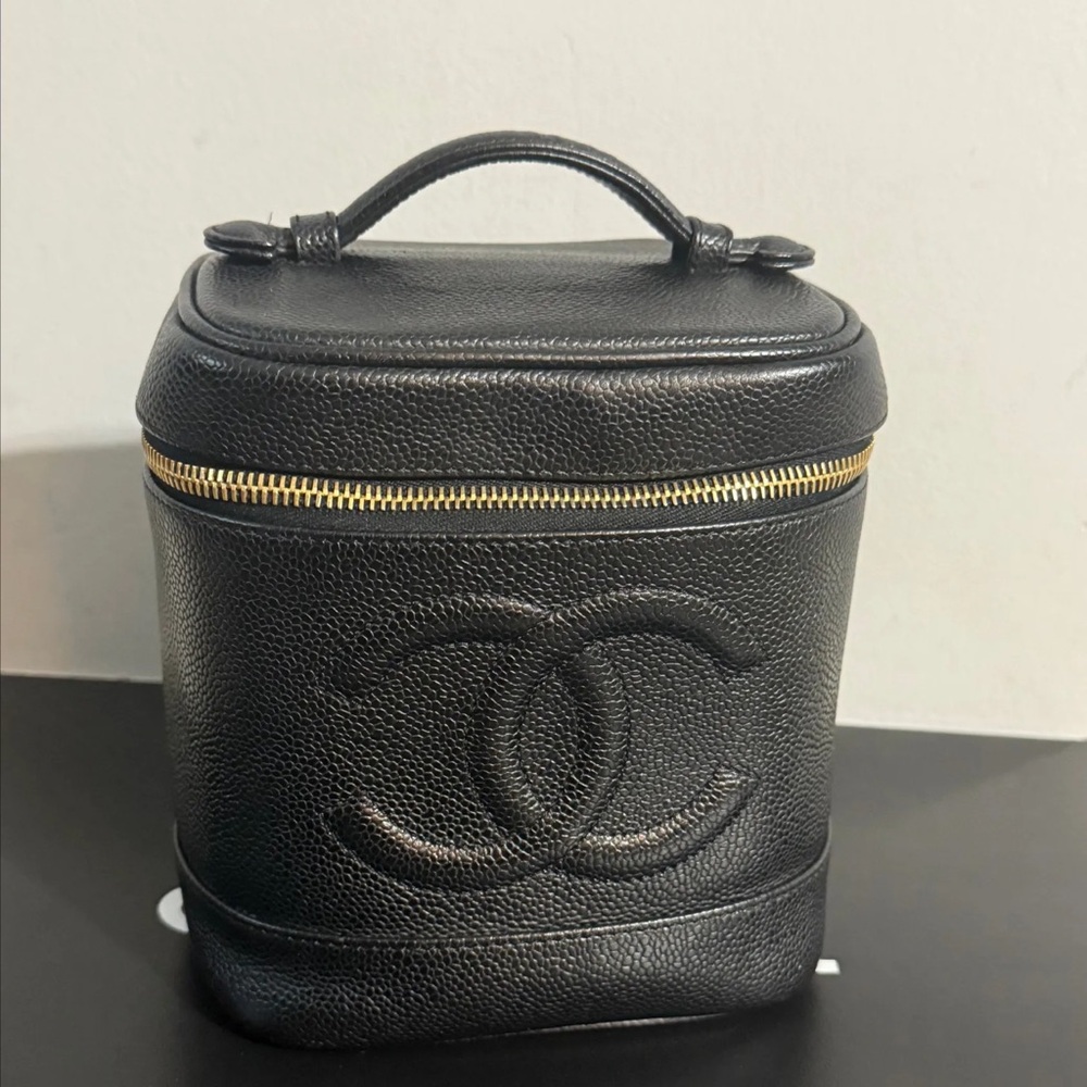 CHANEL Black Vanity Bag with Gold Accents